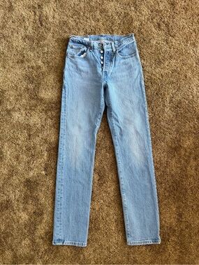 Light wash Levi's 501 straight leg jeans; perfect condition